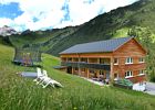 Haus mit Spielplatz und Grillplatz im Hintergrund